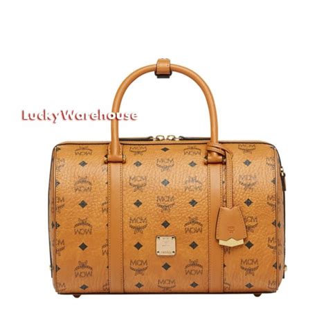 mcm travel bag replica|spotting a genuine mcm bag.